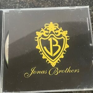 Autographed Jonas Brothers CD with Black and Gold Cover